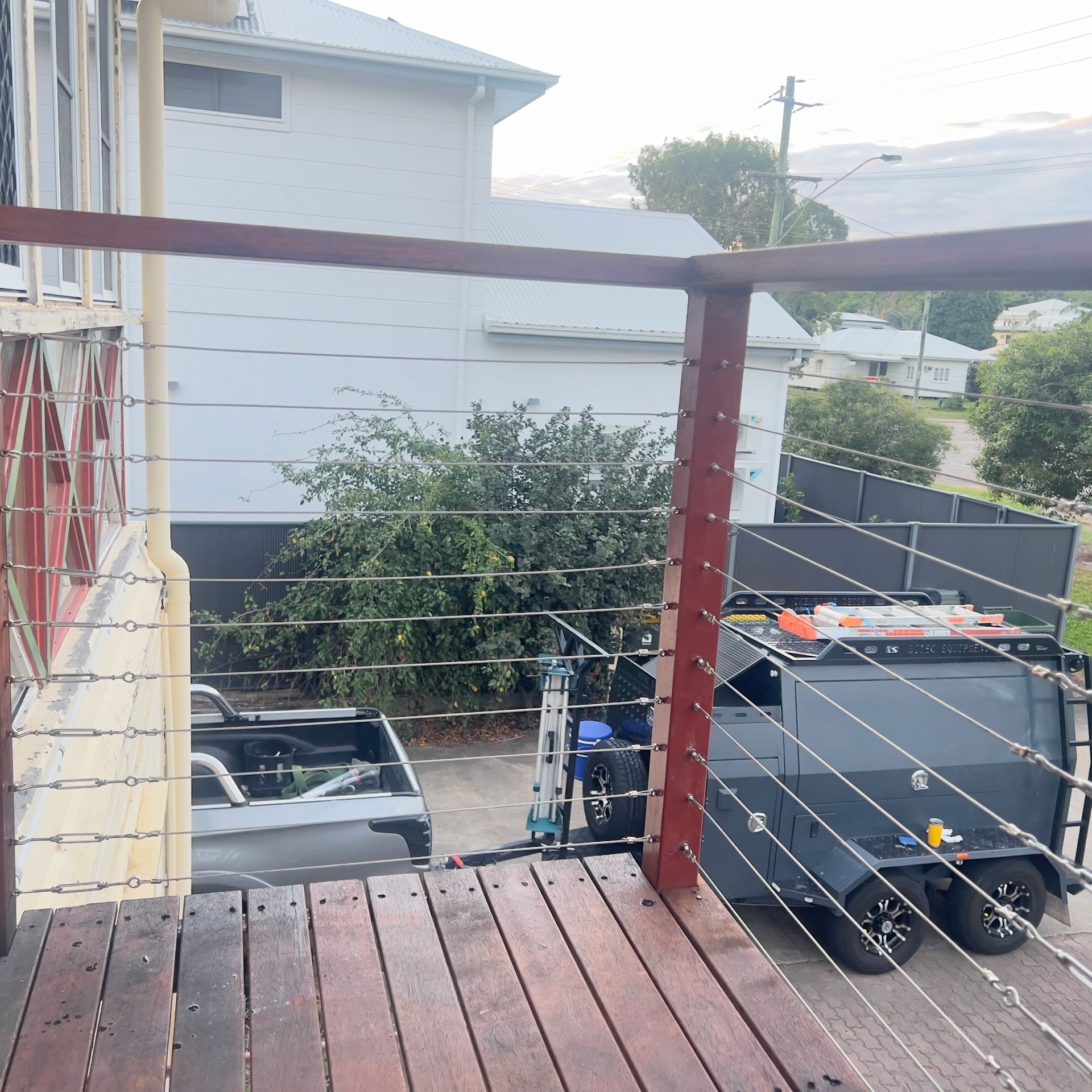 Spacious wooden deck with smooth finish, perfect for outdoor living and entertaining Newly installed timber decking with durable planks